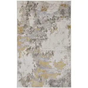 Photo of Ivory Gold And Gray Abstract Stain Resistant Area Rug