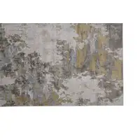 Photo of Ivory Gold And Gray Abstract Stain Resistant Area Rug