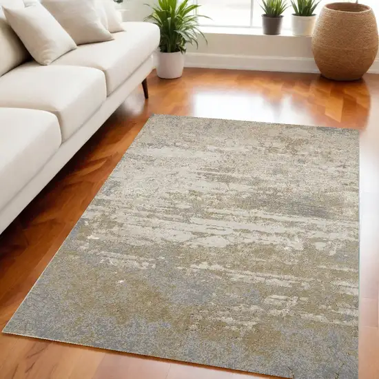 Ivory Gold And Gray Abstract Stain Resistant Area Rug Photo 1