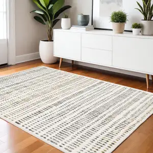 Photo of Ivory Gold And Gray Striped Area Rug