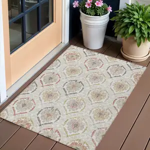 Photo of Ivory Gold And Taupe Medallion Washable Indoor Outdoor Area Rug