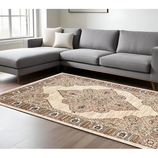 Gold and Ivory Oriental Power Loom Area Rug Photo 1