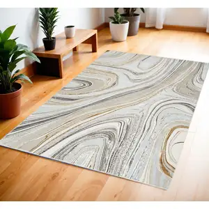 Photo of Ivory Gold and Gray Abstract Non Skid Area Rug