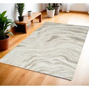 Photo of Ivory Gold and Gray Abstract Non Skid Area Rug