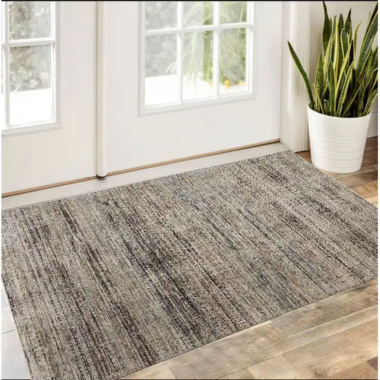 Ivory Gray And Black Abstract Distressed Area Rug With Fringe Photo 1