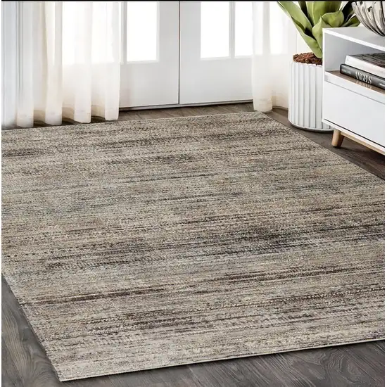 Ivory Gray And Black Abstract Distressed Area Rug With Fringe Photo 1