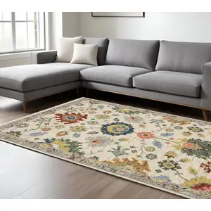 Photo of Ivory Gray And Blue Oriental Area Rug With Fringe