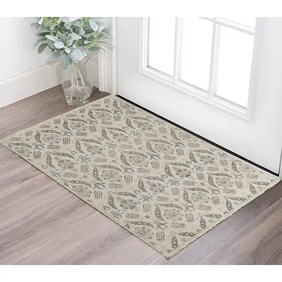 Gray and Ivory Wool Floral Hand Knotted Area Rug Photo 1