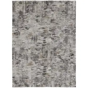 Photo of Ivory Gray And Brown Abstract Power Loom Distressed Stain Resistant Area Rug