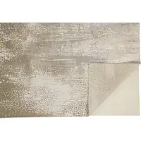 Photo of Ivory Gray And Gold Abstract Stain Resistant Area Rug