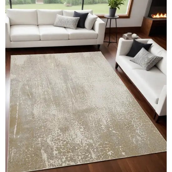 Ivory Gray And Gold Abstract Stain Resistant Area Rug Photo 1