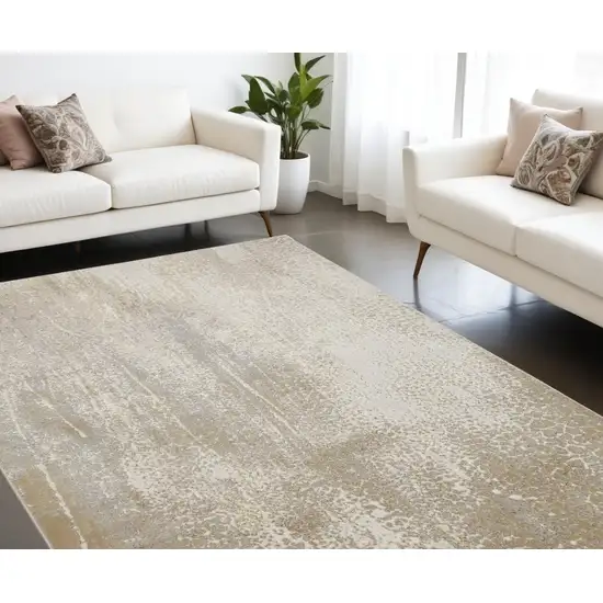 Ivory Gray And Gold Abstract Stain Resistant Area Rug Photo 1