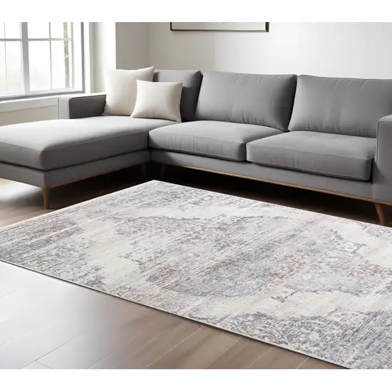 Gray and Ivory Abstract Distressed Area Rug With Fringe Photo 1