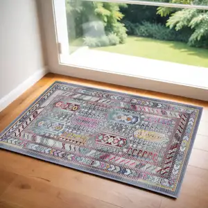 Photo of Ivory Gray And Red Floral Distressed Area Rug