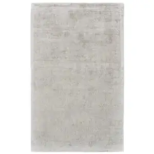 Photo of Ivory Gray And Tan Abstract Hand Woven Area Rug