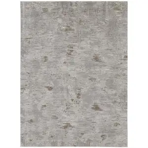 Photo of Ivory Gray And Tan Abstract Power Loom Distressed Stain Resistant Area Rug