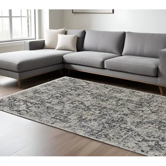 Gray and Ivory Abstract Power Loom Distressed Non Skid Area Rug With Fringe Photo 1