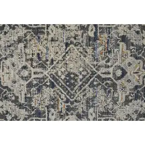 Photo of Ivory Gray And Taupe Abstract Power Loom Distressed Area Rug With Fringe