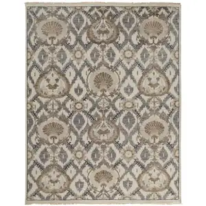 Photo of Ivory Gray And Taupe Wool Floral Hand Knotted Stain Resistant Area Rug