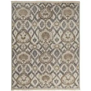 Photo of Ivory Gray And Taupe Wool Floral Hand Knotted Stain Resistant Area Rug