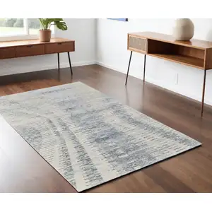 Photo of Ivory Gray and Blue Abstract Hand Knotted Worn Faded Area Rug