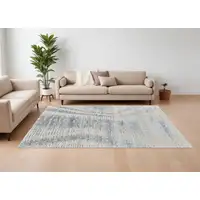 Photo of Ivory Gray and Blue Abstract Hand Knotted Worn Faded Area Rug