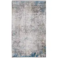 Photo of Ivory Gray and Blue Abstract Power Loom Area Rug With Fringe