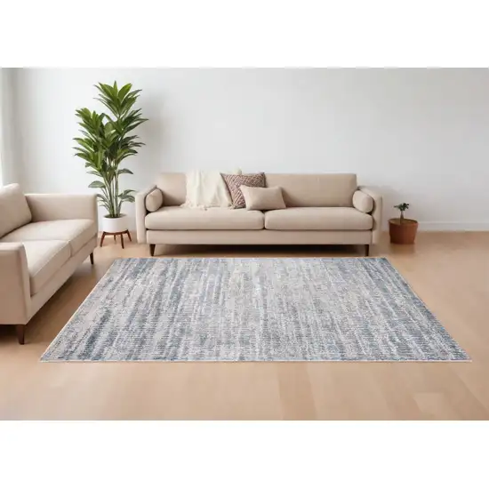 Ivory Gray and Blue Abstract Power Loom Area Rug Photo 1