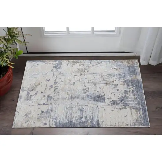 Ivory Gray and Blue Abstract Power Loom Worn Faded Area Rug Photo 1