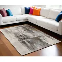 Photo of Ivory Gray and Brown Abstract Power Loom Area Rug