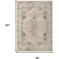 Photo of Ivory Gray and Brown Abstract Power Loom Worn Faded Area Rug With Fringe