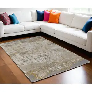 Photo of Ivory Gray and Brown Abstract Power Loom Worn Faded Area Rug