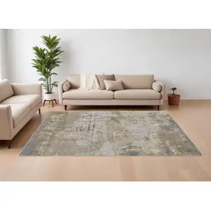 Photo of Ivory Gray and Brown Abstract Power Loom Worn Faded Area Rug