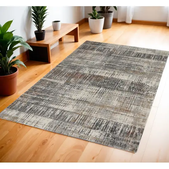 Ivory Gray and Golden Brown Abstract Area Rug Photo 1