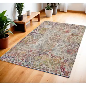 Photo of Ivory Gray and Orange Floral Distressed Non Skid Area Rug