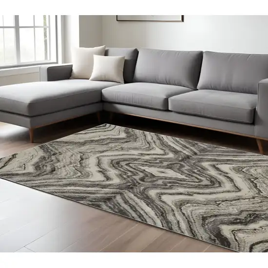 Ivory Gray and Tan Abstract Power Loom Area Rug Photo 1