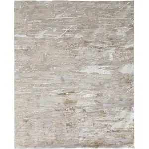 Photo of Ivory Gray and Tan Abstract Power Loom Worn Faded Area Rug