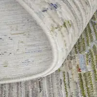 Photo of Ivory Green and Blue Abstract Power Loom Worn Faded Area Rug