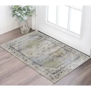 Photo of Ivory Green and Blue Abstract Power Loom Worn Faded Area Rug