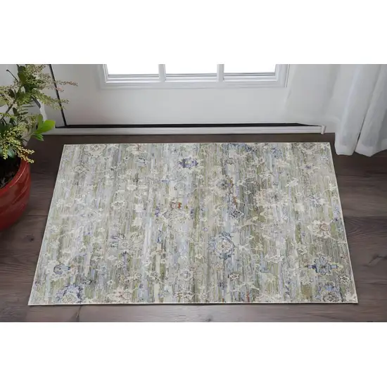 Ivory Green and Blue Floral Power Loom Worn Faded Area Rug Photo 1