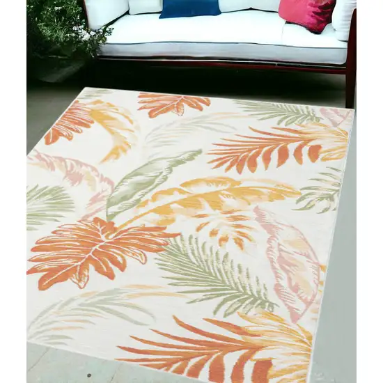 Ivory Green and Orange Palm Leaf Stain Resistant Indoor Outdoor Area Rug Photo 1