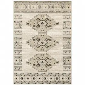 Photo of Ivory Grey Black And Ivory Southwestern Power Loom Stain Resistant Area Rug