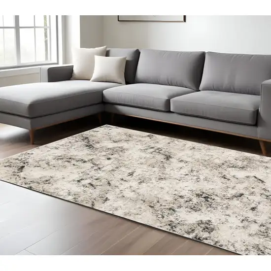 Gray and Ivory Abstract Power Loom Area Rug Photo 1