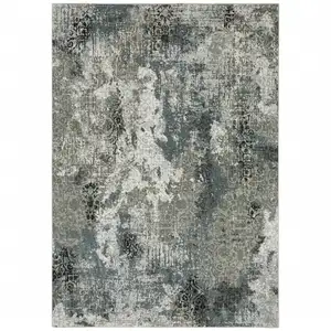 Photo of Ivory Grey Charcoal Blue And Navy Abstract Power Loom Stain Resistant Area Rug