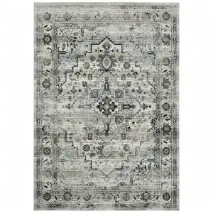 Photo of Ivory Grey Charcoal Blue And Taupe Oriental Power Loom Stain Resistant Area Rug