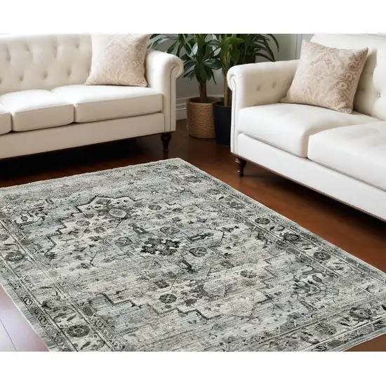 6' X 9' Ivory Grey Charcoal Blue And Taupe Oriental Power Loom Stain Resistant Area Rug Photo 1