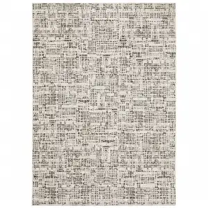 Photo of Ivory Grey Charcoal Brown And Beige Abstract Power Loom Stain Resistant Area Rug