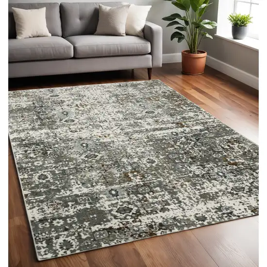 Gray and Ivory Oriental Power Loom Area Rug Photo 1