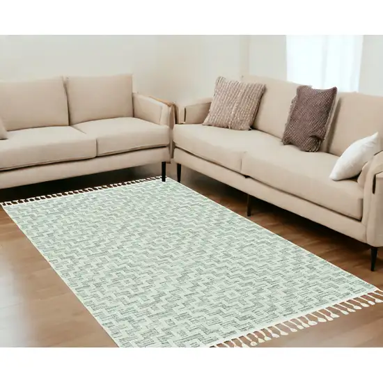 5'X8' Ivory Grey Machine Woven Geometric With Fringe Indoor Area Rug Photo 1