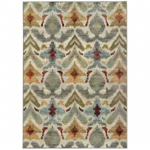 Photo of Ivory Grey Rust Gold And Blue Abstract Power Loom Stain Resistant Area Rug